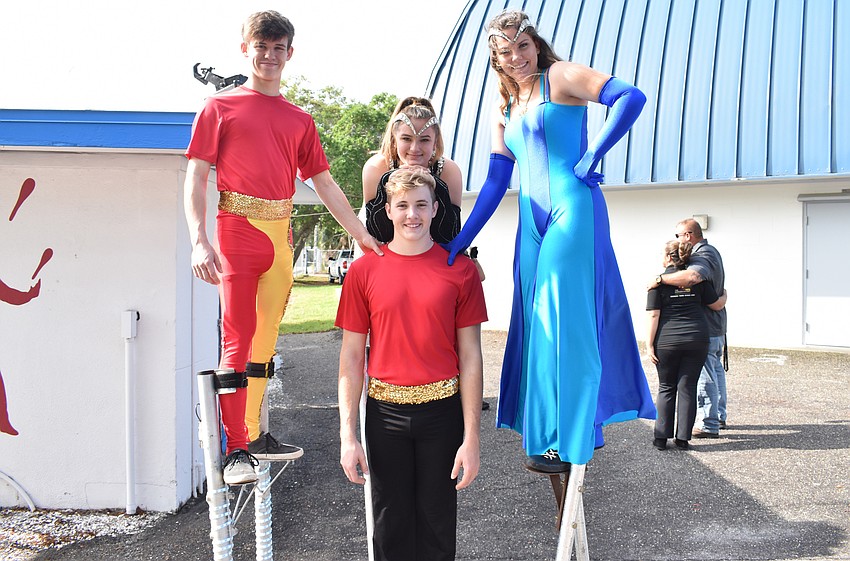 Sailor Circus students Channing Gross, Teagan Allen, Tommy Johnson (not on stilts) and Lillian Hafner