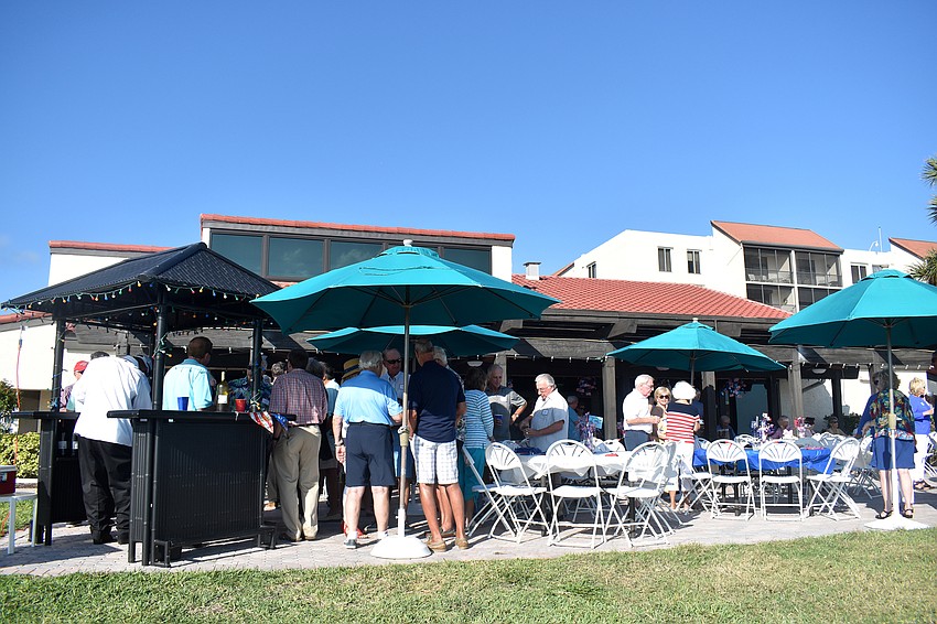 Residents gathered on the patio for dinner and drinks.