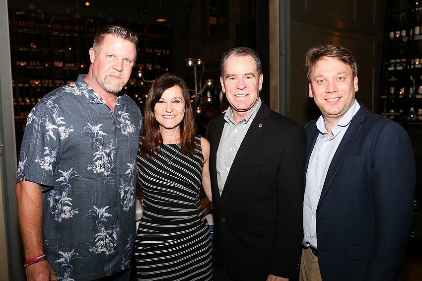 Michael Kulaw, Wendy and Shaun Maraman and Chef Dmitri Atapine