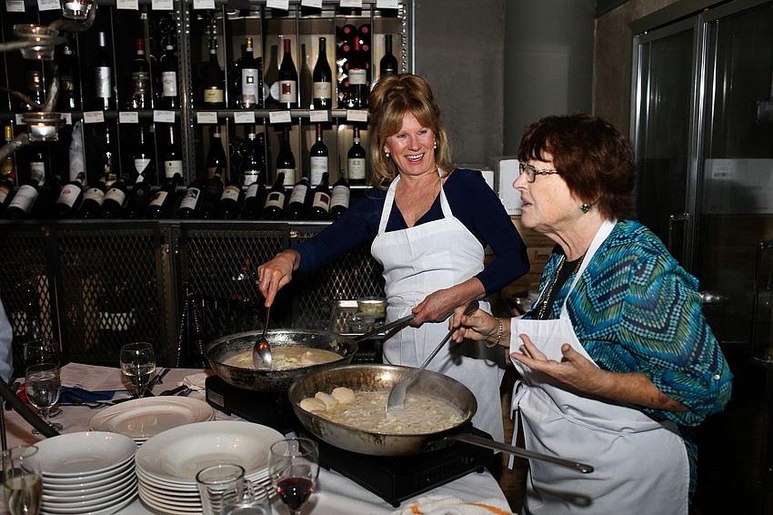 Patti Piper and Ellen Cavanaugh prepare a dish.