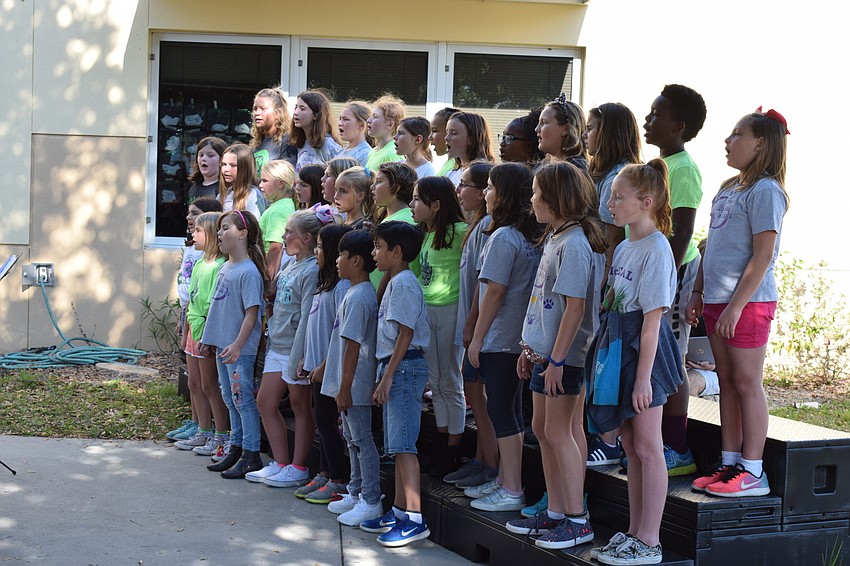 The chorus club, full of third, fourth and fifth graders, sings a rendition of Panic at the Disco's 