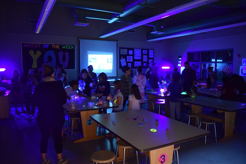 The art room was transformed into a dark room filled with black lights and learning.