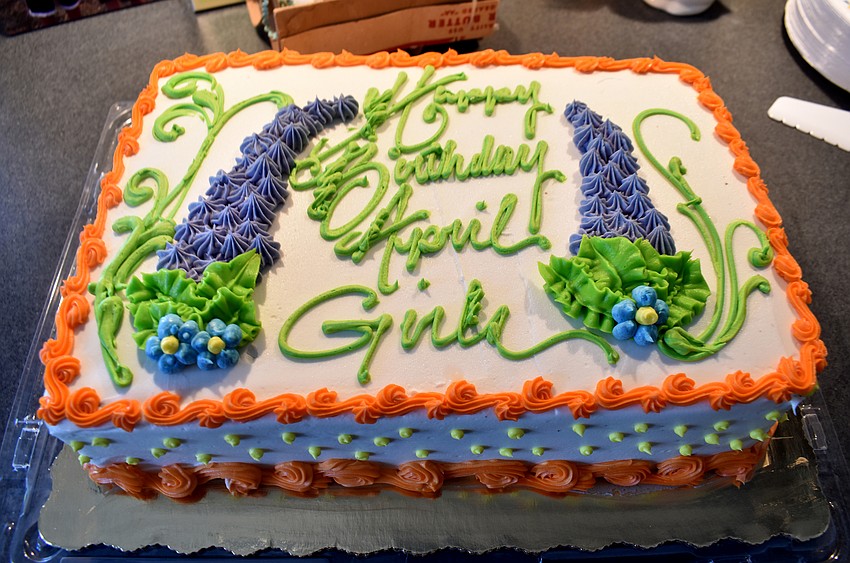 The friends celebrated with cake and appetizers.