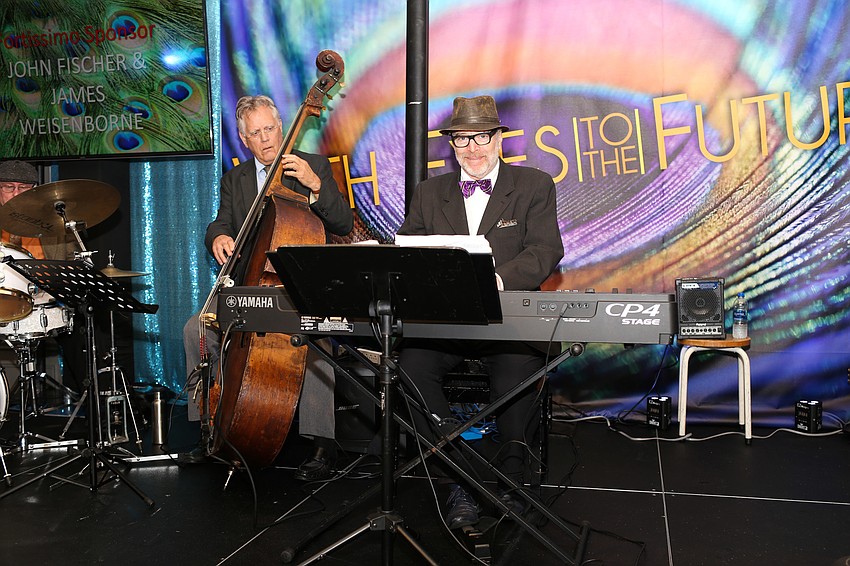 Bill Buchman's Art Of Jazz Trio played music throughout the night.