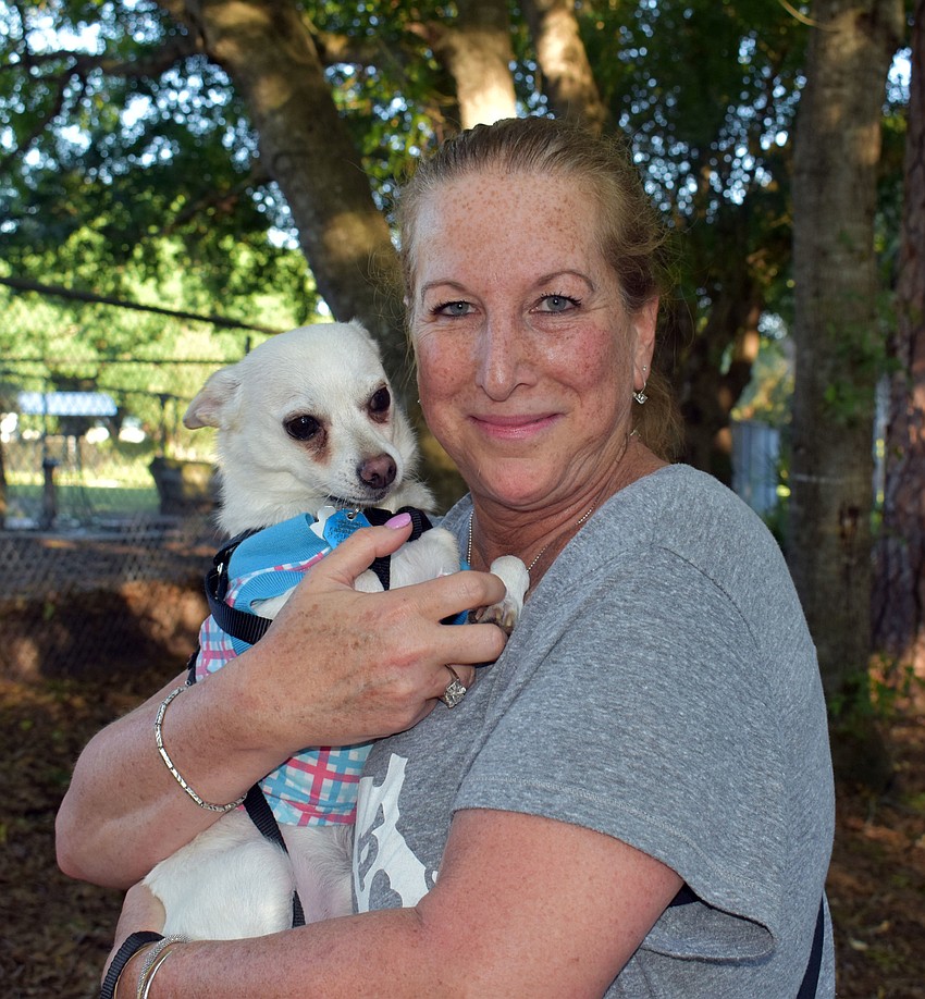 Wendy Rich snuggles up with her chihuahua mix Gabe.
