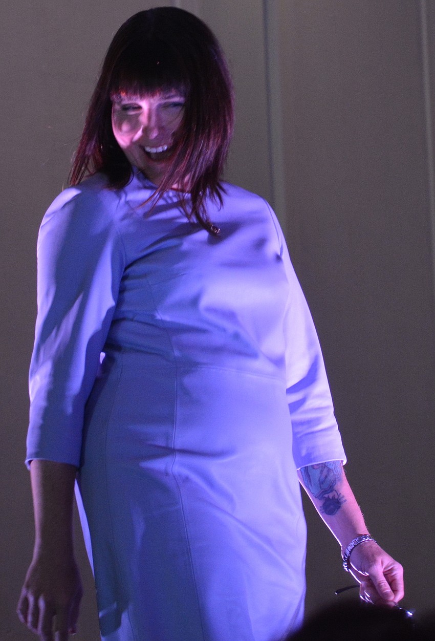 Sisterhood for Good's Laura Lynch models Worth New York fashion.