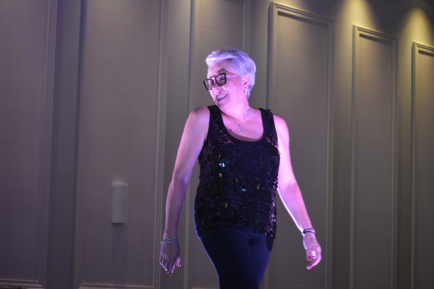 Sisterhood for Good's Teri Stern shows off a casual Worth New York fashion.