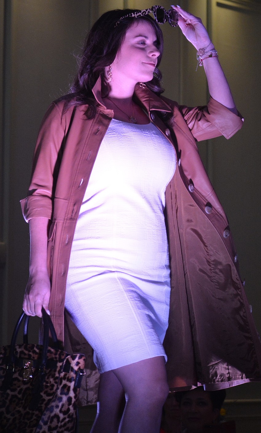 Sisterhood for Good's  Breanca Niski takes her turn down the runway at Spring Sensations.