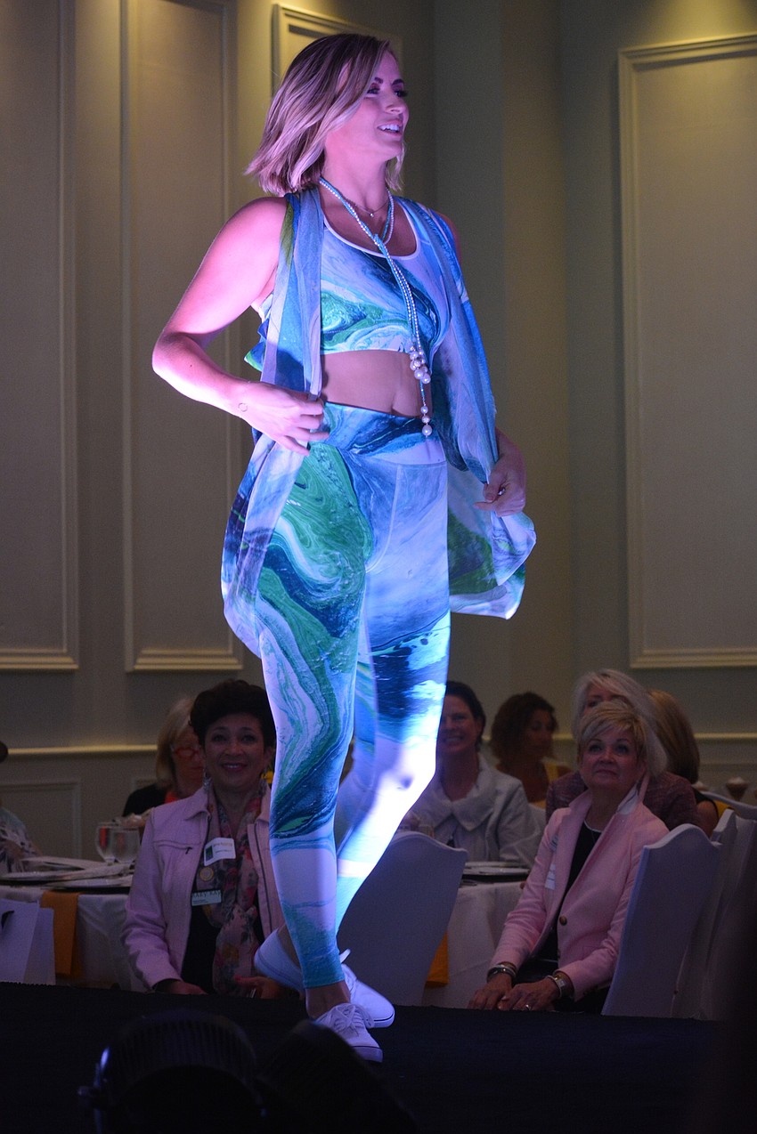 Taylor Ross shows off Debbie Dannheisser Threads at Spring Sensations.