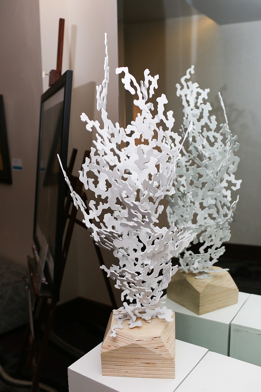 Guests bid on pieces of art throughout cocktail hour.