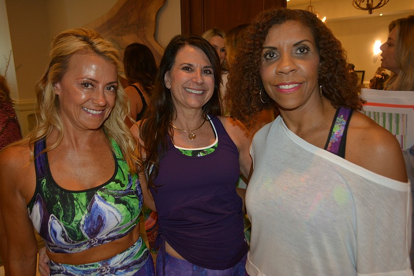 Kathleen Abrams, Beth Golden and Michelle Davis get ready to go on the runway to represent zumbasarasota.com.