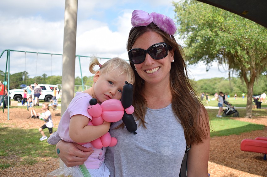 Edgewater's Meg Fant brought her daughter, Natalie, along for the Easter festivities.