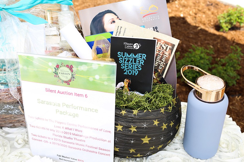 Guests bid on the silent auction items throughout the morning.