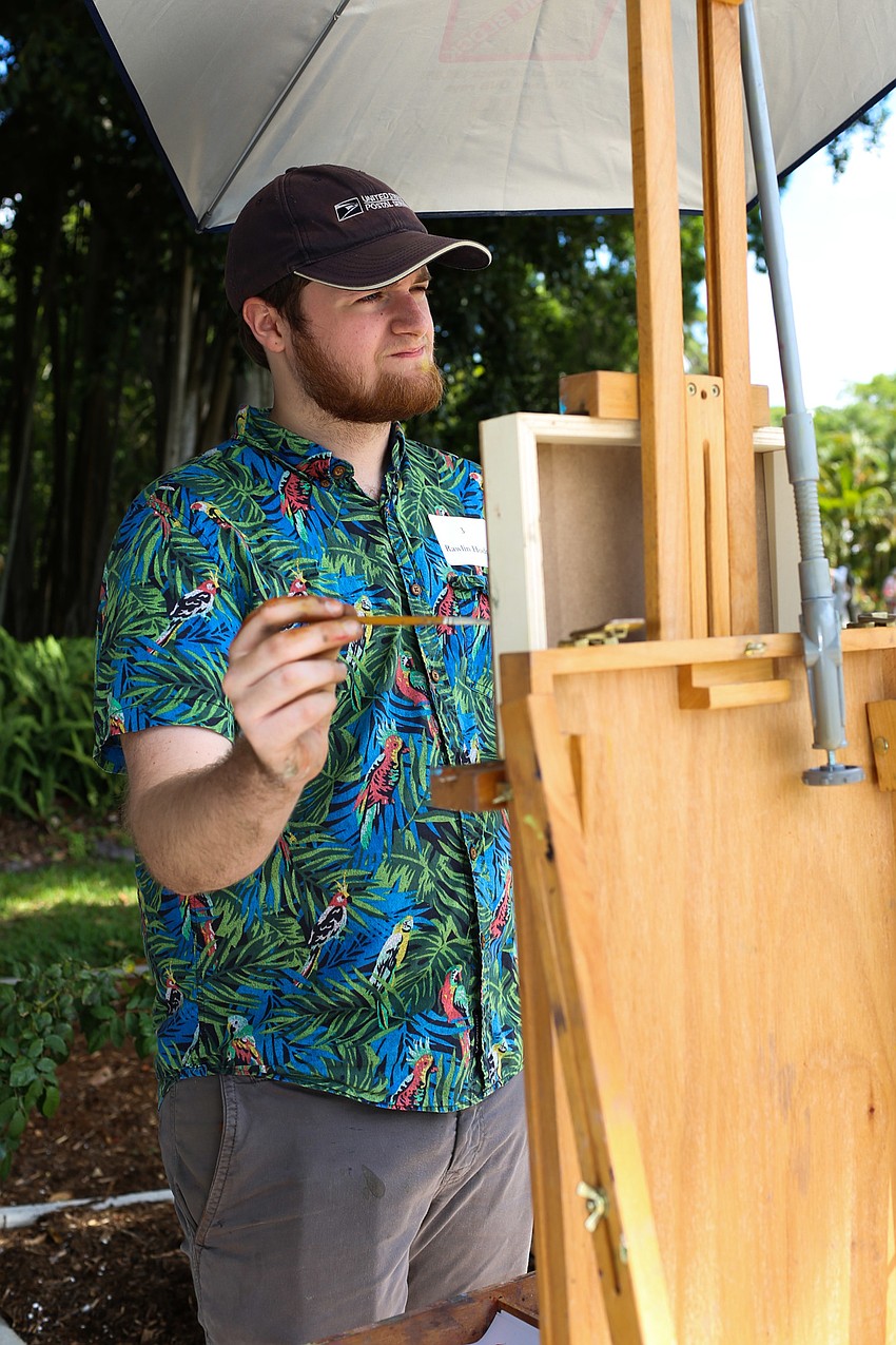 Ringling College student Rawlin Hodge paints the scene.
