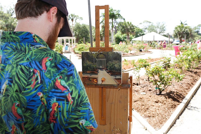 Ringling College student Rawlin Hodge paints the scene.