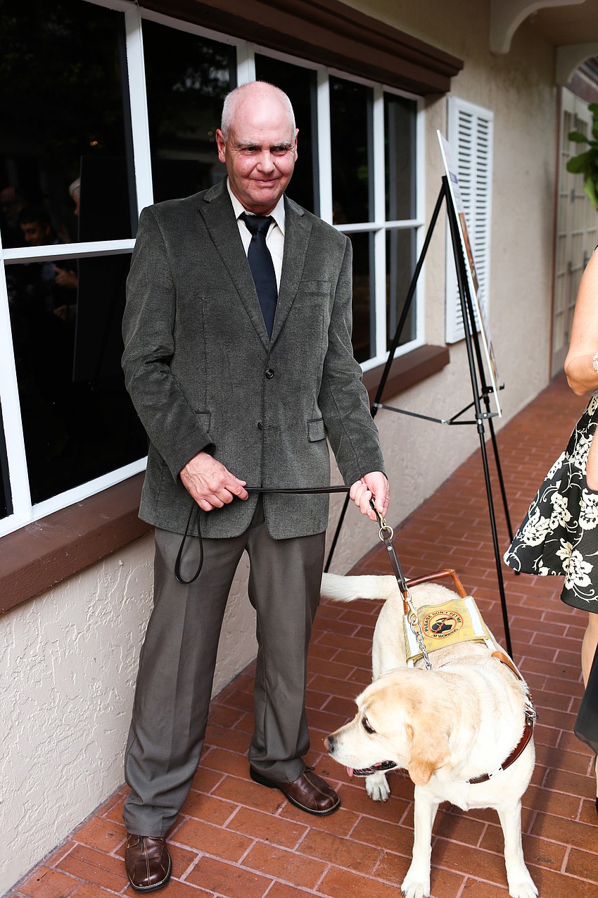 Richard Draper and his service dog Andie