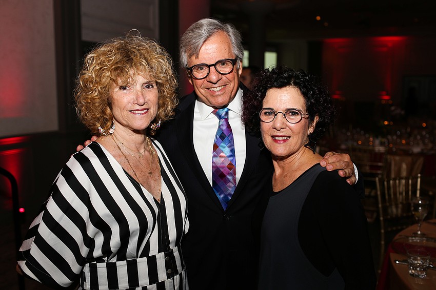 Iris Burnett, Executive Director Bruce Rodgers and Lisa Rubinstein