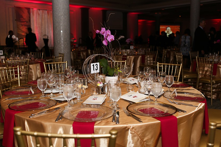 The ballroom was decorated in gold and red.