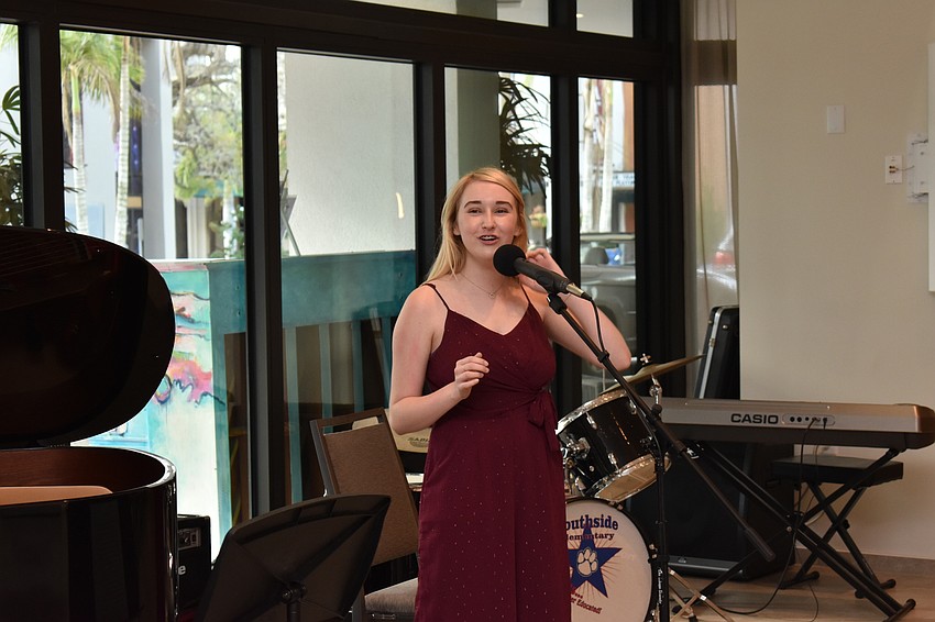 Ainsley Costello, a former Southside Elementary student, sang for the fundraiser.