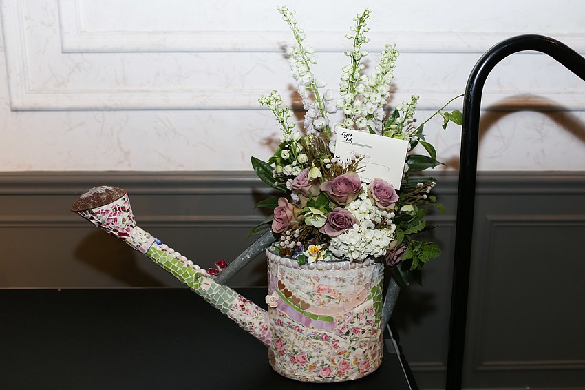 Lauren Walsh and the Friends of the Sarasota Ballet gifted Margaret Barbieri with a bouquet.