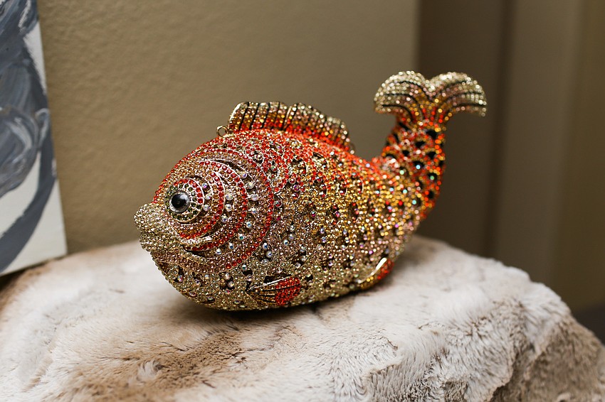 Phillips rocked this Kate Spade fish purse at the 2016 Firefly Gala.