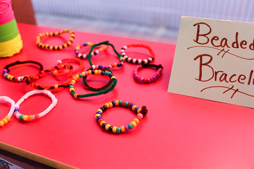 Guests used Girls Inc dollars to shop the Dream Weaver Market.