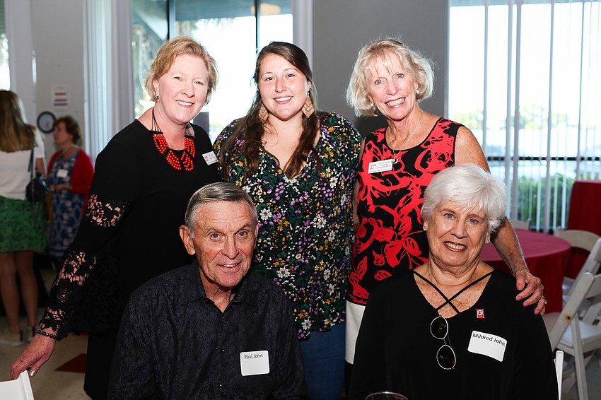 President and CEO Angie Stringer, Alyssa and Cynthia Sweeney and Paul and Mildred John