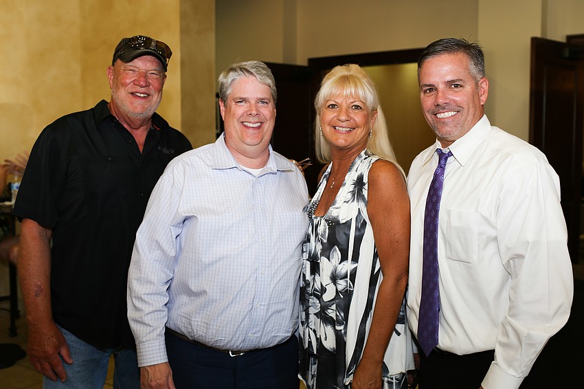 Co-Chairman Rick Rossiter, Stanley Eding, Executive Director Lucy Nicardi and Co-Chairman Greg Lineham