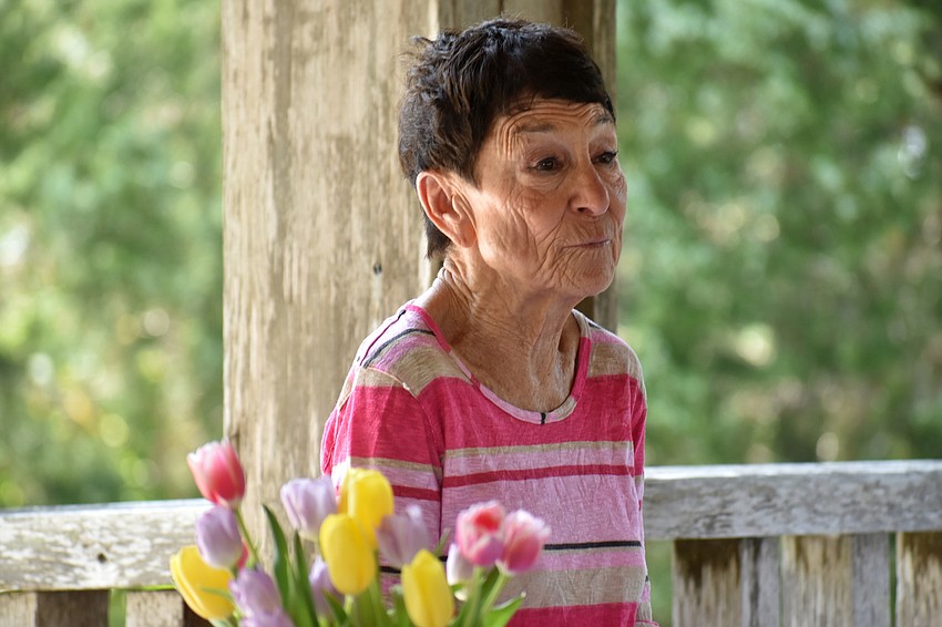 Susan Landau announces that the club gave 179 books to Children First.