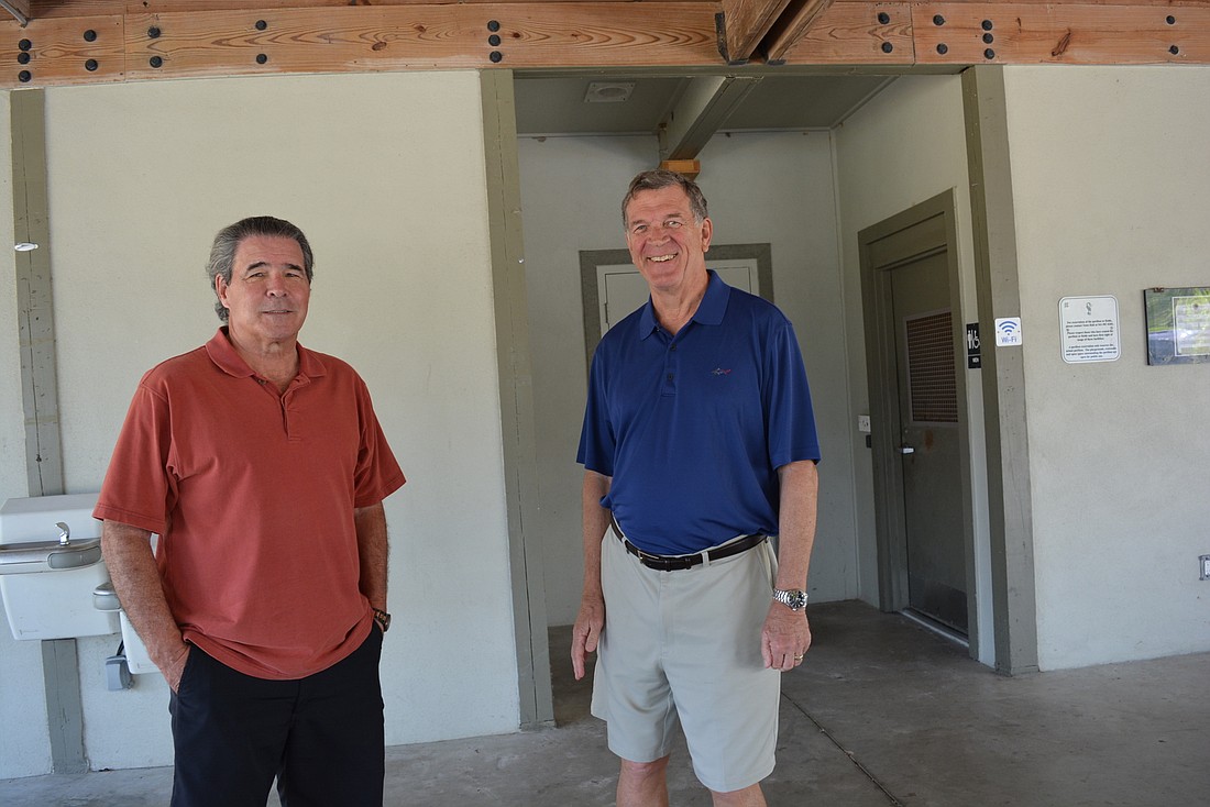 Lakewood Ranch Community Development District 4 Supervisors Mike Griffin and Keith Davey say improvements to the bathrooms at Greenbrook Adventure Park are needed. Photo by Pam Eubanks.