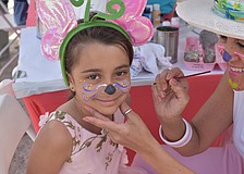 Miah Malur gets her face painted to look like a bunny.