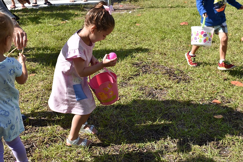 Guiliana Genovese grabs one of her five eggs.