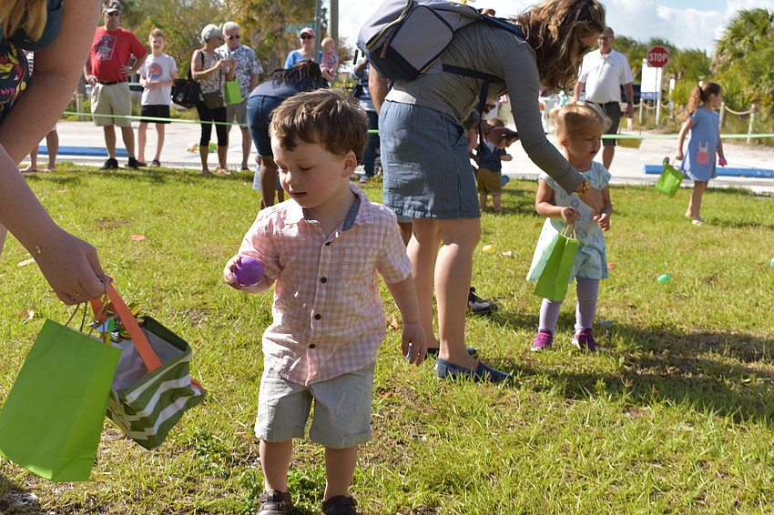 Rory Dulski drops his egg into his basket.