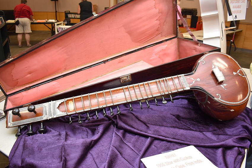 The rare sitar was for sale at the musical flea market.