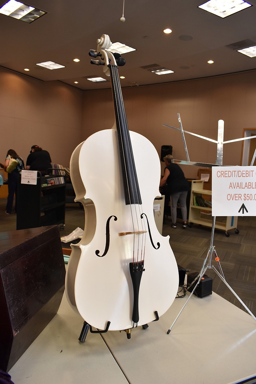 The handmade white cello was one of the main centerpieces of the musical flea market.
