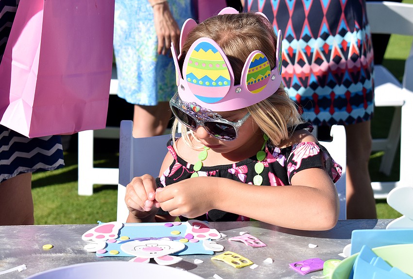 Addison Lemke makes an Easter craft.