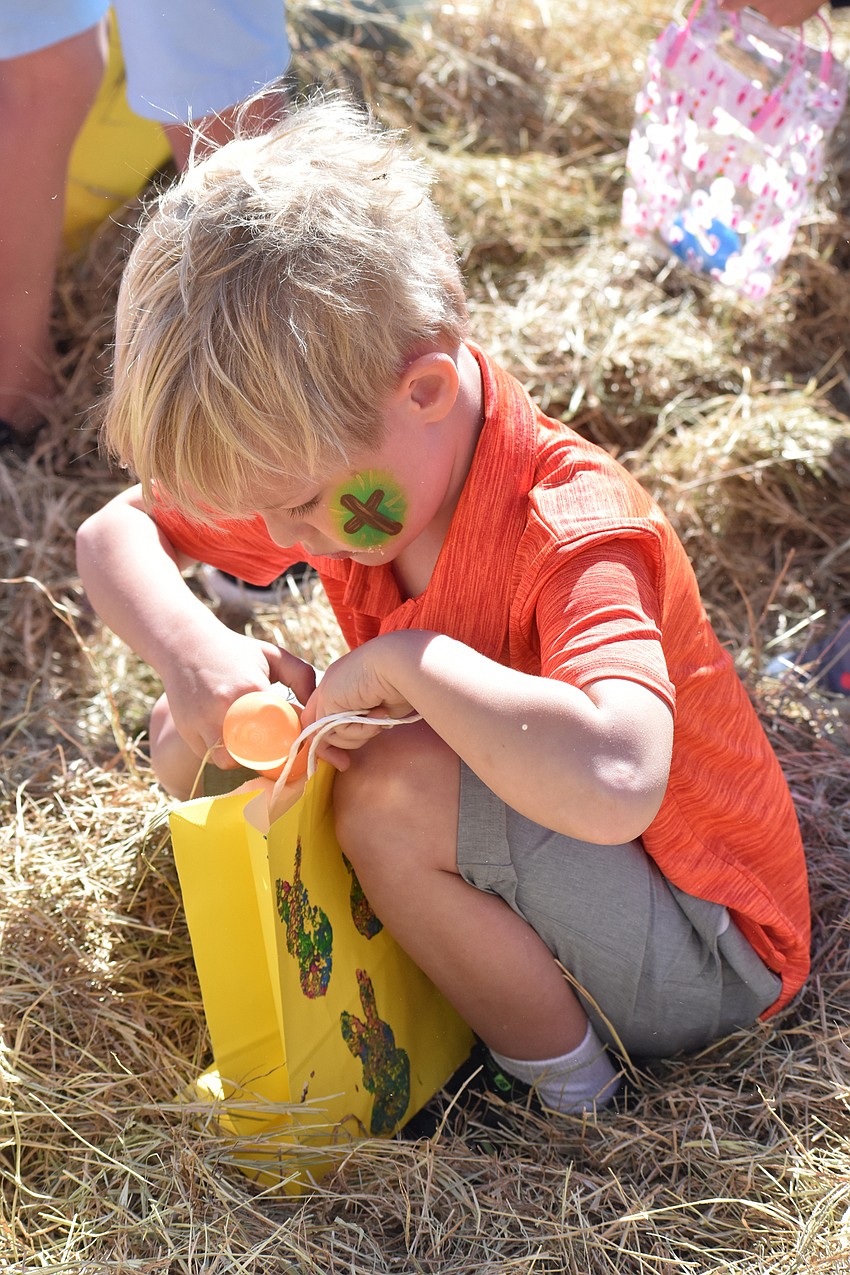 Jack Shyjan, 6, searches for Easter eggs.