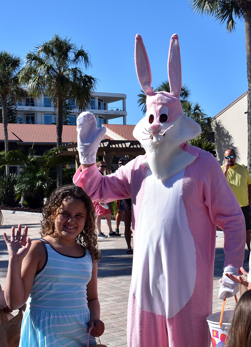 Elizabeth Calderon smiled for a photo with the Easter bunny.