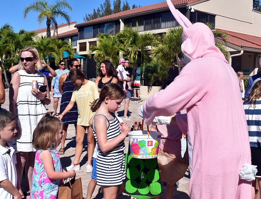 Kids lined up to get some goodies from the Easter Bunny.