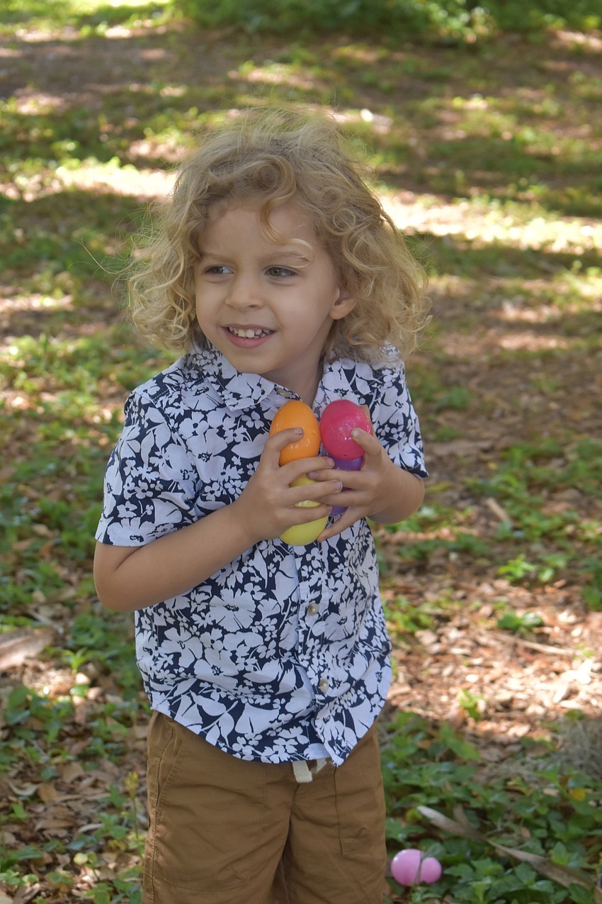 Archer Oberhaus tried to hold as many eggs as he could.