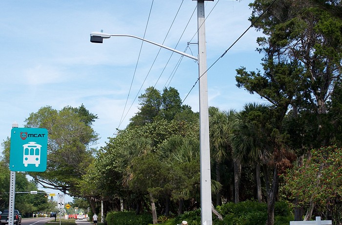 Town officials have said many of the town&#39;s existing poles, like this one, are taller than the proposed 35  feet.