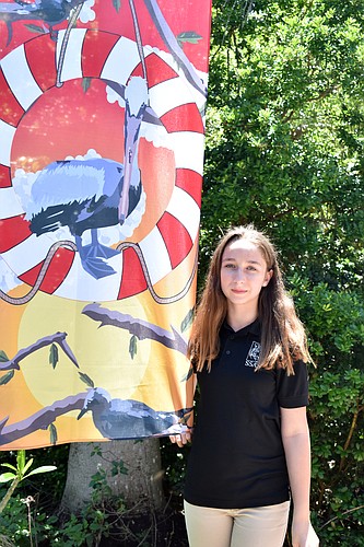 Seventh grader Katherine Wright has two banners hanging at Save Our Seabirds.