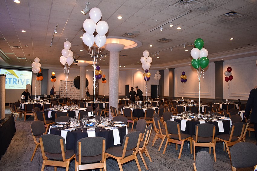 The colorful balloons marked the seating areas for each school.