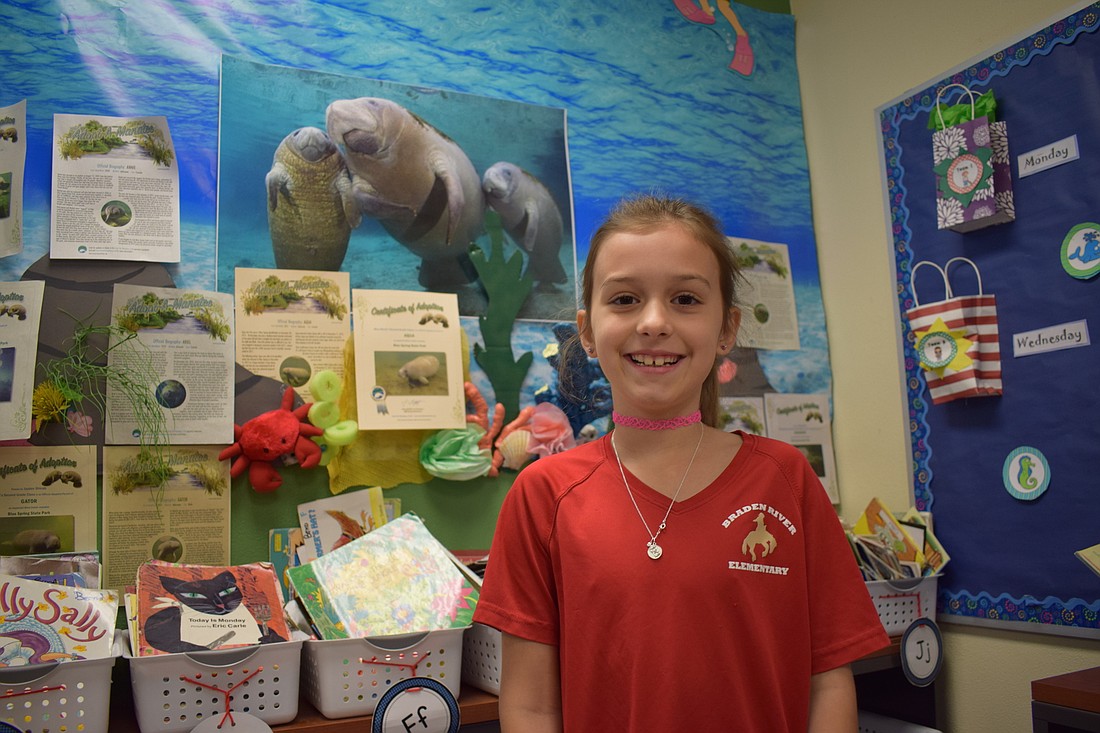 Second grader Rylan Post said her favorite part about manatees is that they have nails on their flippers. She&#39;s helped adopt eight of the manatees.