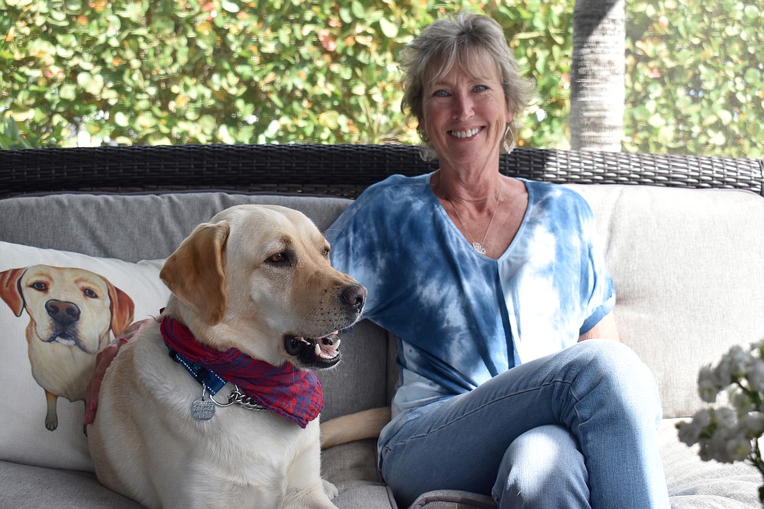 Patty McBride,  here with her dog Honey, says volunteering at Southeastern Guide Dogs keeps her active physically and mentally.