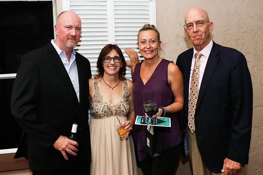 Chad and Executive Director Colleen thayer, Kimberly Thomason and Steve Remis