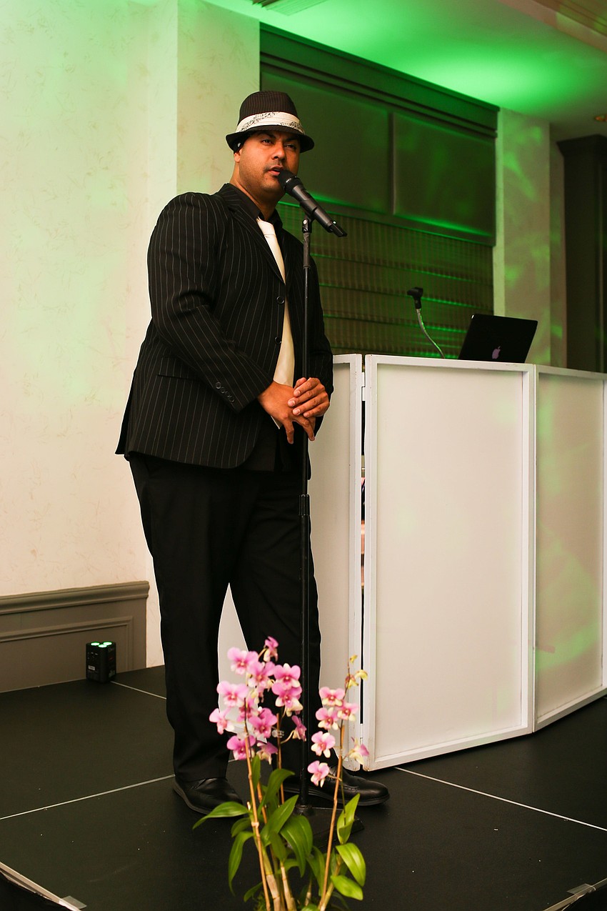 Jonathan Cortez sings during dinner.