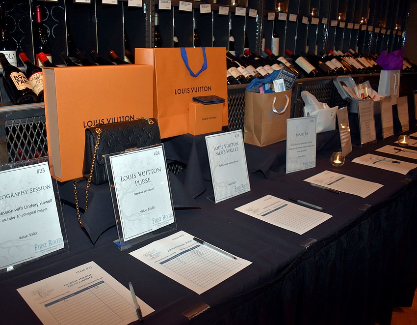 Guests could bid on a Louis Vuitton purse and wallet as part of the silent auction.