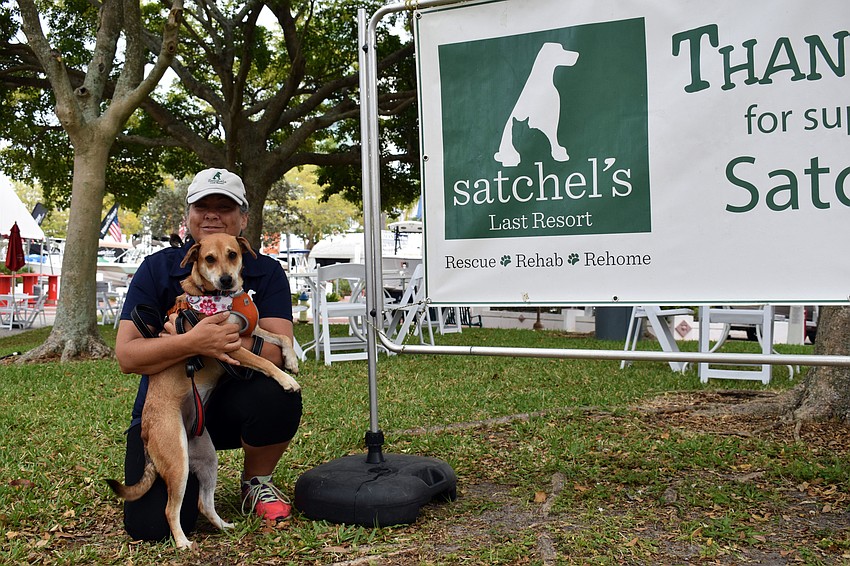 Maria Shay shows of Mindy, a dog available for adoption at Satchel's Last Resort.