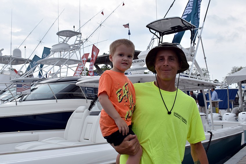 3-year-old River loved looking at the big boats with his dad Gabriel Finfrock.